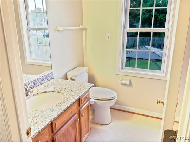 8069 Kiwi Ln, Mechanicsville, VA 23111 - half bathroom featuring baseboards, toilet, and vanity