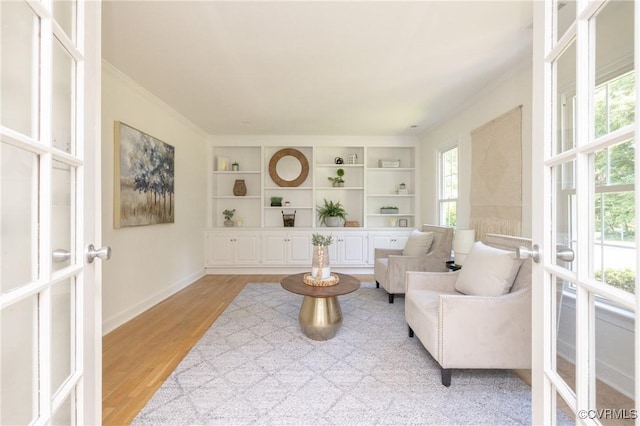 13119 Glenmeadow Ct, Midlothian, VA 23114 - living room featuring french doors, light wood-style floors, baseboards, and built in features