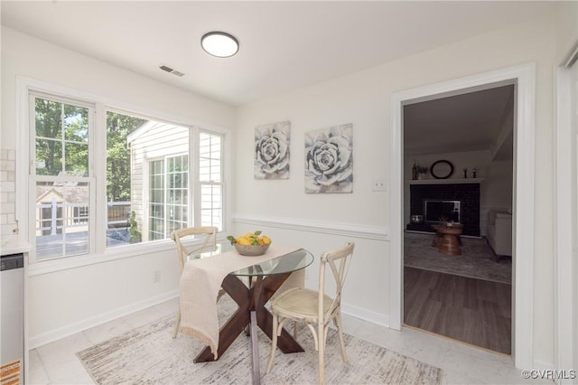 13119 Glenmeadow Ct, Midlothian, VA 23114 - dining space with a fireplace