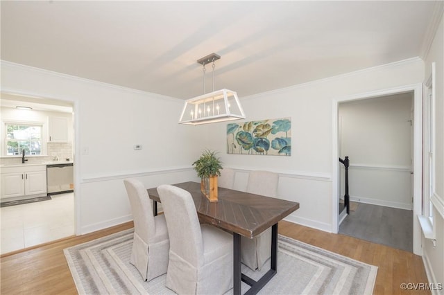 13119 Glenmeadow Ct, Midlothian, VA 23114 - dining area featuring light wood-style flooring and crown molding