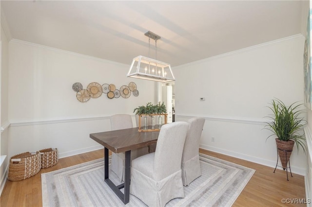 13119 Glenmeadow Ct, Midlothian, VA 23114 - dining space with light wood-type flooring, crown molding, and a chandelier