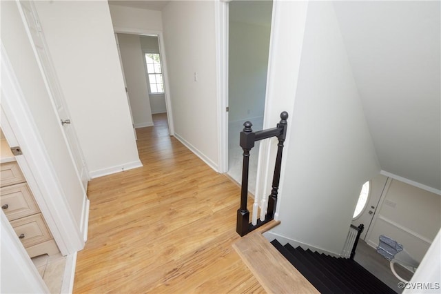 13119 Glenmeadow Ct, Midlothian, VA 23114 - corridor with light wood-style flooring, an upstairs landing, and baseboards