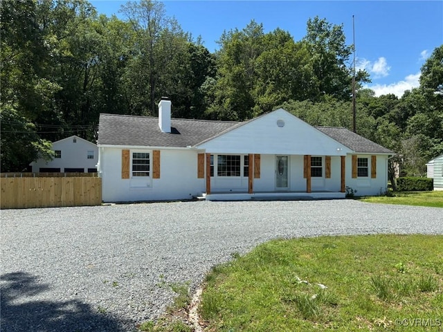 23766 Kings Hwy, Warsaw, VA 22572 - ranch-style home featuring a porch, a chimney, and driveway