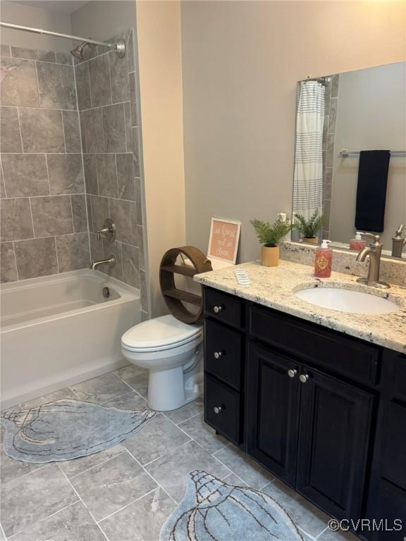 23766 Kings Hwy, Warsaw, VA 22572 - bathroom with shower / bath combination, toilet, and vanity