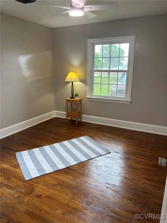 23766 Kings Hwy, Warsaw, VA 22572 - spare room featuring ceiling fan, baseboards, and wood finished floors
