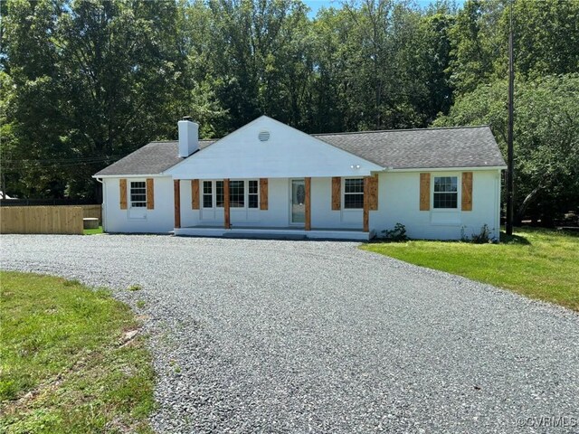 23766 Kings Hwy, Warsaw, VA 22572 - single story home featuring gravel driveway, a chimney, and covered porch