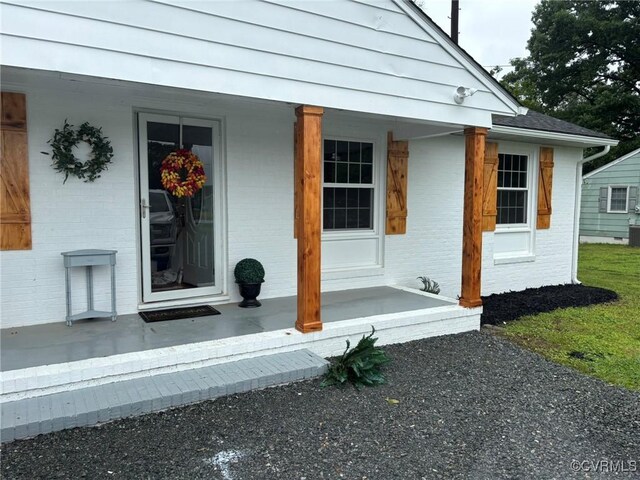 23766 Kings Hwy, Warsaw, VA 22572 - entrance to property featuring a porch and brick siding