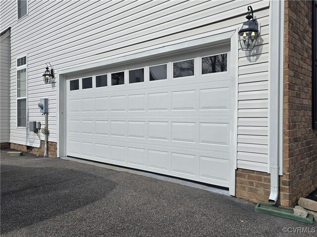 1308 Hammerstone Ct, Richmond, VA 23223 - garage featuring driveway