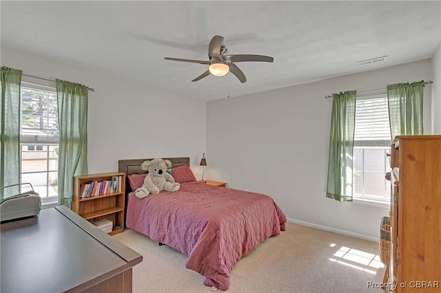 802 Westgate Ct, Newport News, VA 23602 - bedroom with light carpet, baseboards, and a ceiling fan