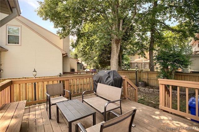 802 Westgate Ct, Newport News, VA 23602 - wooden terrace with a grill and a fenced backyard