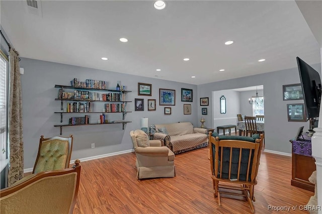 802 Westgate Ct, Newport News, VA 23602 - living room featuring wood finished floors, recessed lighting, a chandelier, and baseboards