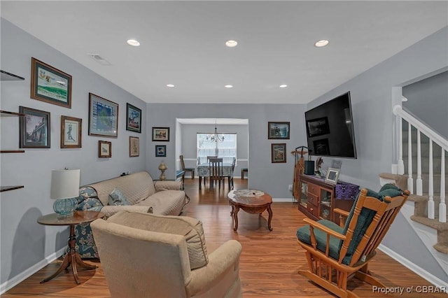 802 Westgate Ct, Newport News, VA 23602 - living area featuring stairway, wood finished floors, a chandelier, baseboards, and recessed lighting