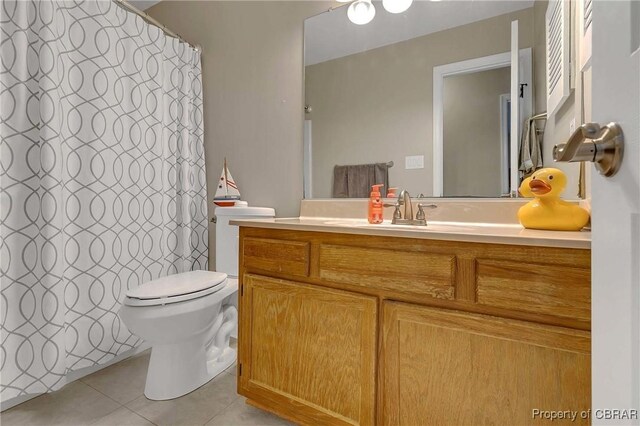 802 Westgate Ct, Newport News, VA 23602 - full bath featuring tile patterned floors, toilet, vanity, and curtained shower