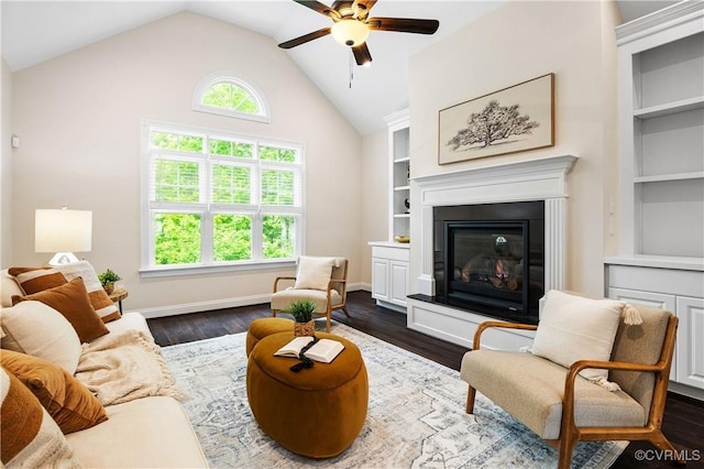 3904 Ambergrove Ave, Chesterfield, VA 23236 - living room with ceiling fan, lofted ceiling, dark wood finished floors, a glass covered fireplace, and built in features