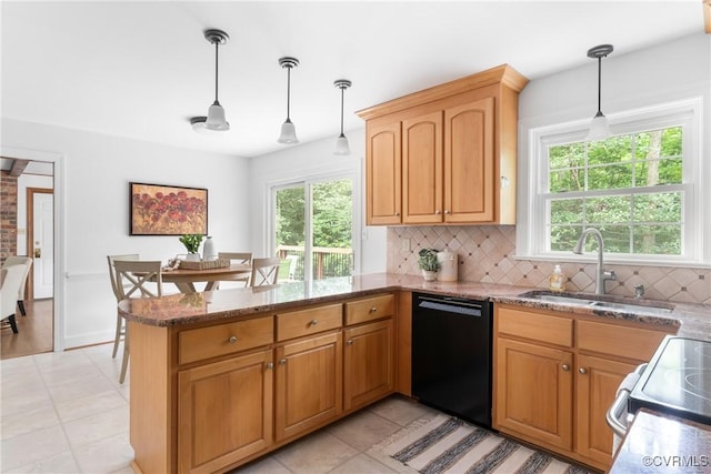 4204 Poplar Grove Ter, Chesterfield, VA 23112 - kitchen with black dishwasher, a peninsula, healthy amount of natural light, and decorative backsplash