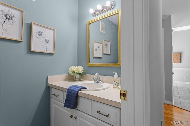 6730 Bryanbell Dr, North Chesterfield, VA 23234 - bathroom featuring vanity, wood finished floors, and baseboards