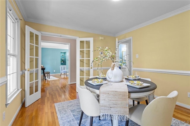 6730 Bryanbell Dr, North Chesterfield, VA 23234 - dining room featuring french doors, wood finished floors, ornamental molding, and healthy amount of natural light