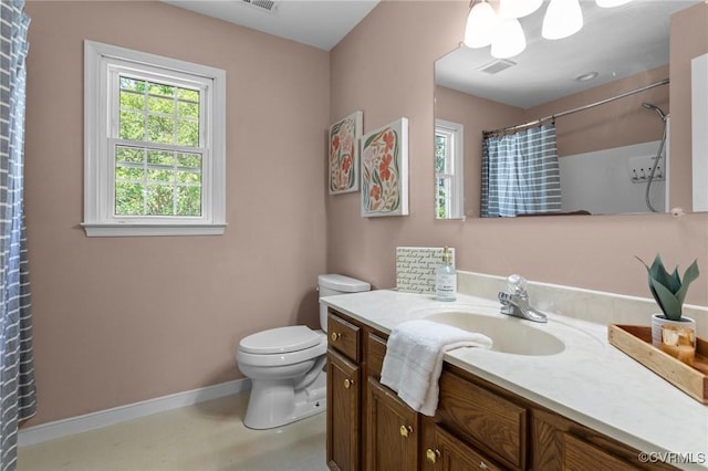 6730 Bryanbell Dr, North Chesterfield, VA 23234 - bathroom with toilet, baseboards, vanity, and a shower with shower curtain