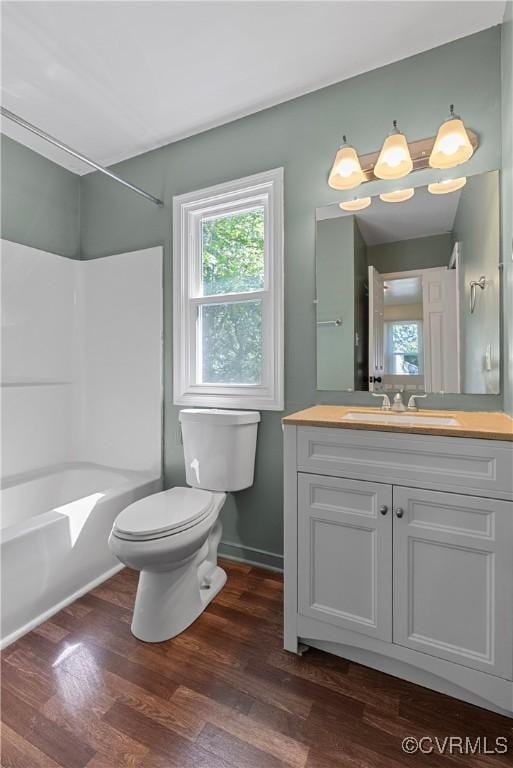 1409 Sycamore Ridge Ct, Midlothian, VA 23114 - bathroom featuring toilet, healthy amount of natural light, wood finished floors, and vanity