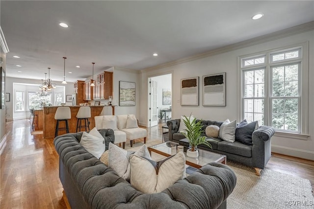 3330 Handley Rd, Midlothian, VA 23113 - living room with baseboards, recessed lighting, crown molding, light wood-style flooring, and a chandelier