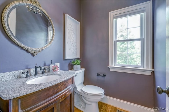 3330 Handley Rd, Midlothian, VA 23113 - bathroom featuring healthy amount of natural light, vanity, toilet, and baseboards