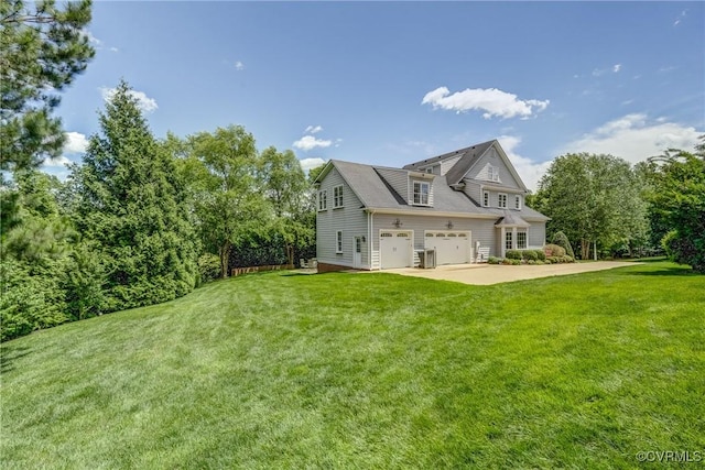 3330 Handley Rd, Midlothian, VA 23113 - view of side of home with an attached garage, driveway, and a yard