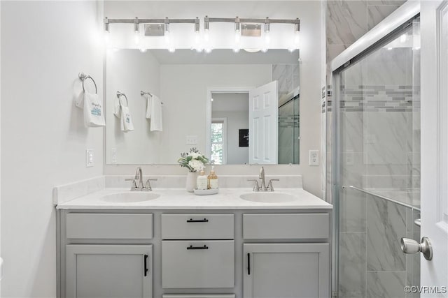1117 N 31st St, Richmond, VA 23223 - bathroom featuring a stall shower and double vanity