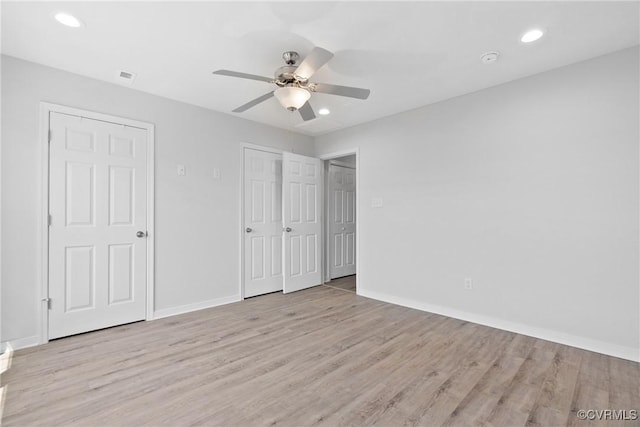 1117 N 31st St, Richmond, VA 23223 - unfurnished bedroom featuring wood finished floors, recessed lighting, and a ceiling fan