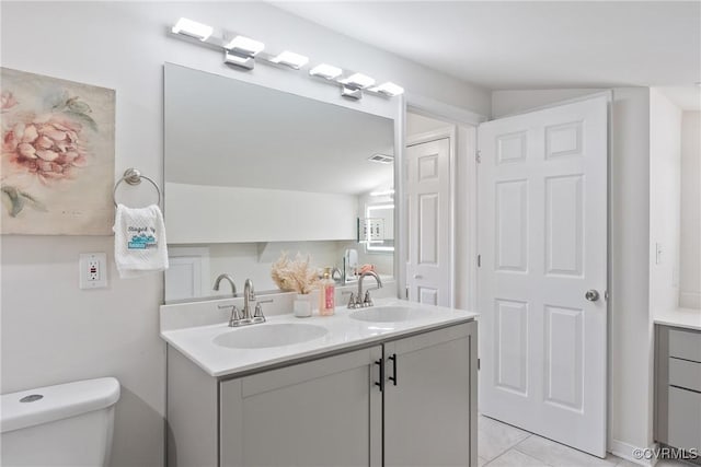1117 N 31st St, Richmond, VA 23223 - full bath with double vanity and tile patterned flooring