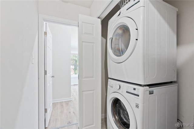 1117 N 31st St, Richmond, VA 23223 - laundry area featuring estacked washer and dryer and baseboards
