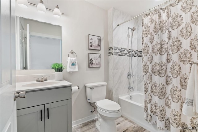 1117 N 31st St, Richmond, VA 23223 - bathroom with vanity, shower / tub combo with curtain, and wood finished floors