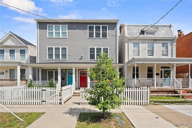 1117 N 31st St, Richmond, VA 23223 - multi unit property with a porch and a fenced front yard