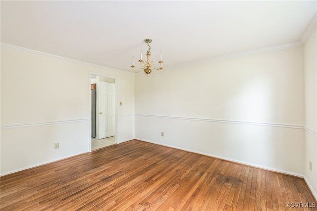 9645 Benbow Rd, North Chesterfield, VA 23235 - unfurnished room with a chandelier, wood-type flooring, ornamental molding, and baseboards