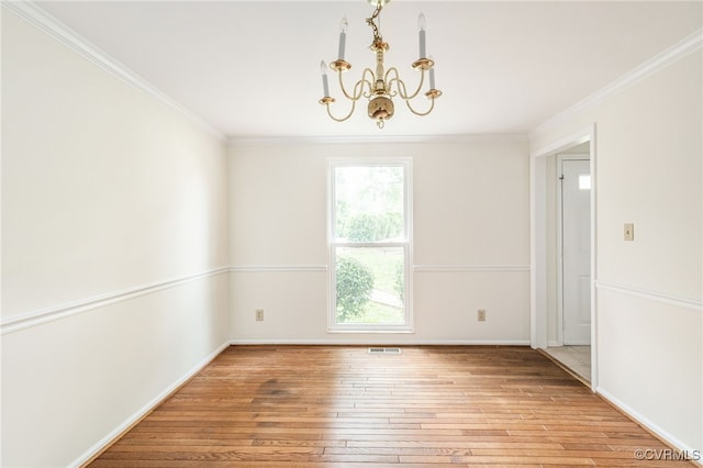 9645 Benbow Rd, North Chesterfield, VA 23235 - unfurnished room featuring a chandelier, light wood finished floors, crown molding, and baseboards