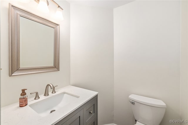 9645 Benbow Rd, North Chesterfield, VA 23235 - half bathroom featuring vanity and toilet