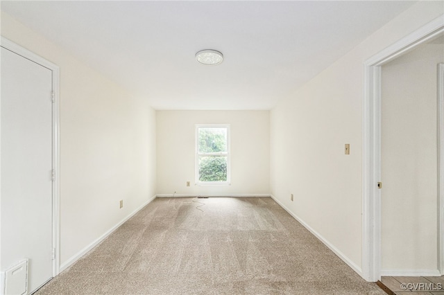 9645 Benbow Rd, North Chesterfield, VA 23235 - carpeted spare room featuring baseboards