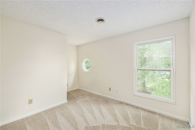 9645 Benbow Rd, North Chesterfield, VA 23235 - carpeted spare room featuring baseboards and a textured ceiling