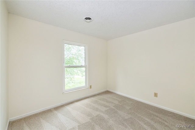 9645 Benbow Rd, North Chesterfield, VA 23235 - unfurnished room with light carpet, baseboards, and a textured ceiling