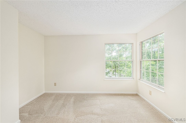9645 Benbow Rd, North Chesterfield, VA 23235 - spare room with carpet, baseboards, and a textured ceiling