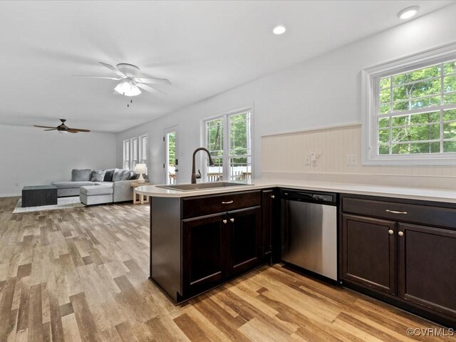 11660 Oakrise Pl, New Kent, VA 23124 - kitchen with a sink, dishwasher, ceiling fan, light countertops, and light wood-style flooring