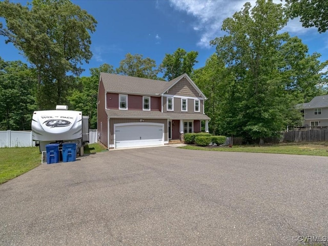 11660 Oakrise Pl, New Kent, VA 23124 - view of front facade featuring a garage and driveway