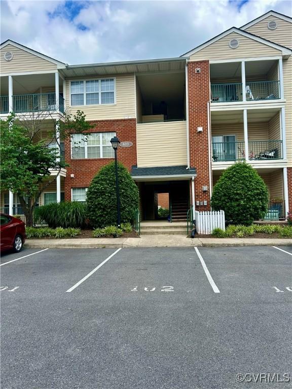 820 Brassie Ln Unit B, Glen Allen, VA 23059 - view of building exterior featuring uncovered parking