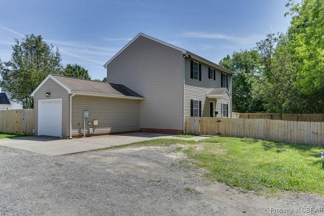 1928 Box St, Hampton, VA 23661 - rear view of property with concrete driveway and a garage