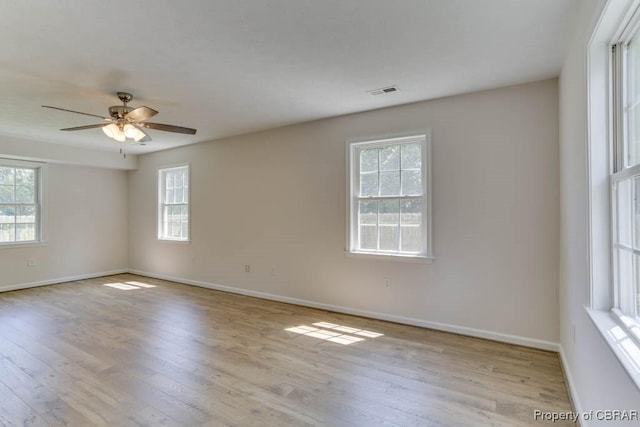 1928 Box St, Hampton, VA 23661 - unfurnished room featuring wood finished floors, a ceiling fan, and baseboards