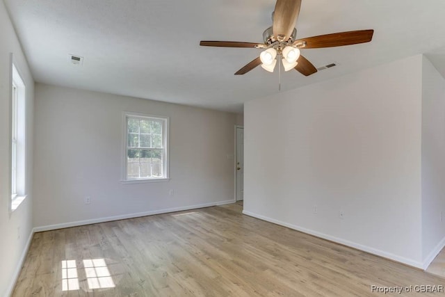 1928 Box St, Hampton, VA 23661 - empty room with ceiling fan, baseboards, and light wood finished floors