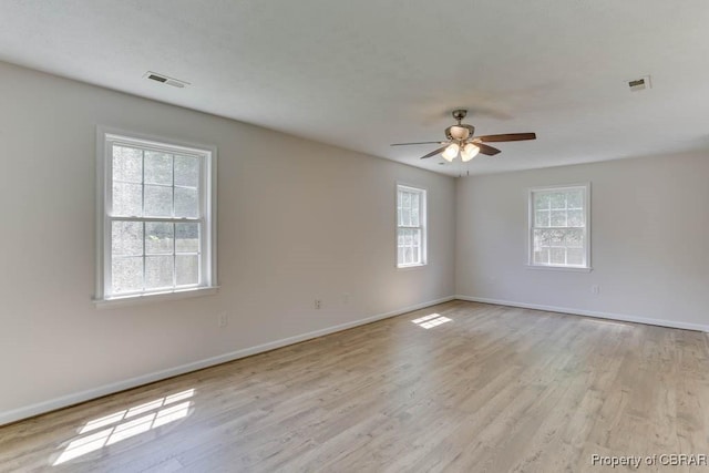 1928 Box St, Hampton, VA 23661 - unfurnished room featuring ceiling fan, baseboards, and light wood-style floors