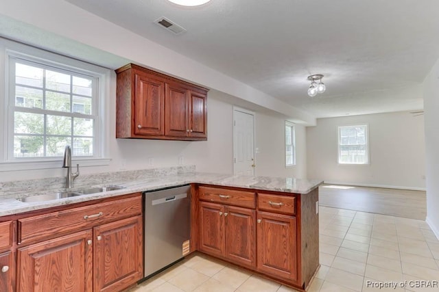 1928 Box St, Hampton, VA 23661 - kitchen featuring dishwasher, a sink, a peninsula, and healthy amount of natural light