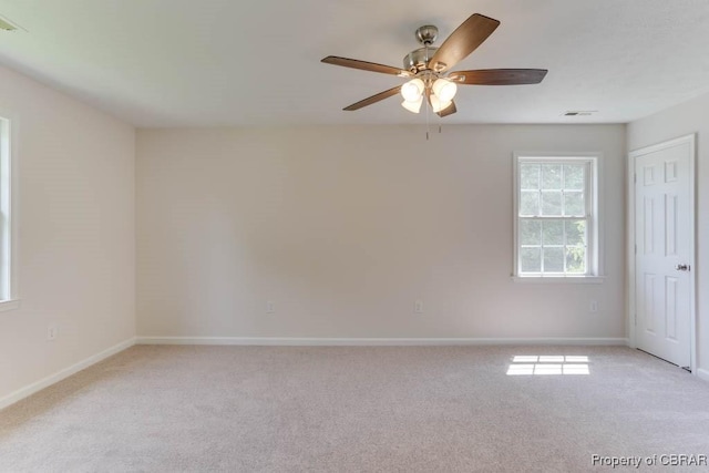 1928 Box St, Hampton, VA 23661 - spare room with light colored carpet, baseboards, and ceiling fan