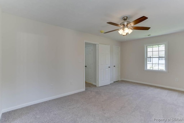 1928 Box St, Hampton, VA 23661 - unfurnished bedroom featuring light colored carpet, baseboards, and ceiling fan