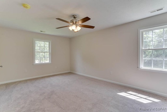 1928 Box St, Hampton, VA 23661 - spare room with light carpet, ceiling fan, and baseboards
